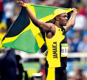 Usain Bolt with Jamaican flag