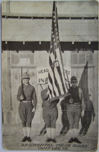 WWI Color Guard at an Army camp. America woul eventually enter the conflict