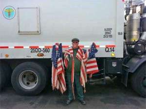 Shevlin displays flags recovered from his sanitation truck.