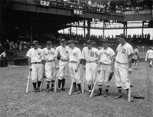 Surrounded by All-Stars in 1937, Joe DiMaggio stands in the center