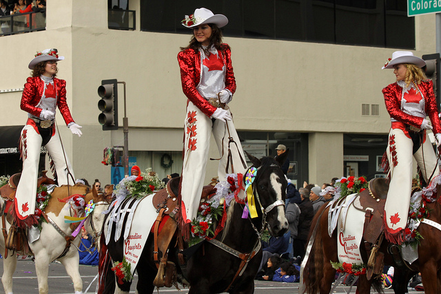 The Canadian Cowgirls sporting their Canada flag inspired costumes at the 2013 Rose Parade. Photo by Prayitno