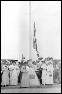 A century ago, members of the Daughters of the American Revolution honor Old Glory.