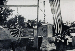 In 1912, DAR members raised flags.