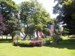 Flags decorate the town square in Angelica. (James Breig photo)