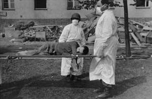 Medical personnel care for a Langenstein survivor