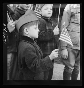 Chicago children wave flags during a flag dedication ceremony in 1942. (Library of Congress)