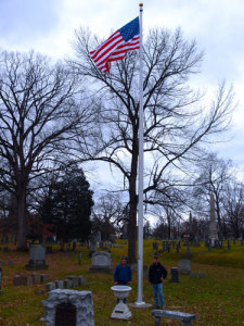 Mike & Sean pose with the new flagpole.