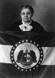 Marie Oliver with her original Missouri flag. (State Historical Society)
