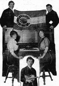 Students prepare for a 1913 concert in which they formed a living Colorado flag. (Denver Post)