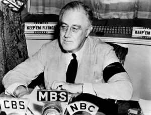 President Roosevelt, wearing a mourning band for his late mother, speaks about freedom of the seas on the radio