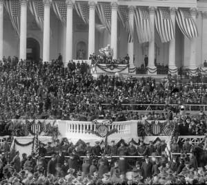 Backed by many American flags, President Wilson speaks at his 1917 inauguration. (Library of Congress)