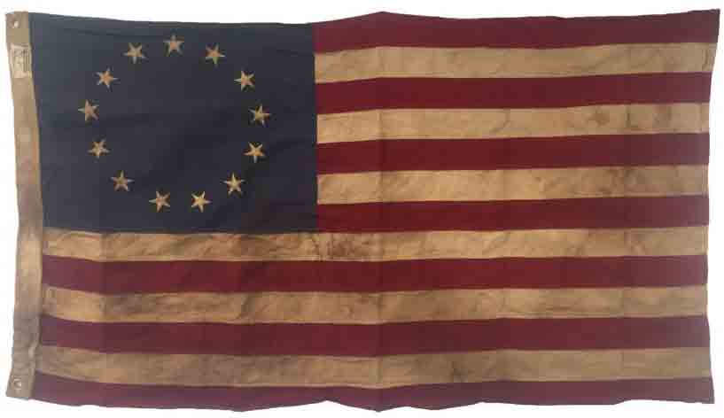The Stars and Stripes, as designed by Betsy Ross, was hoisted on the sloop-of-war Ranger, making her the first American warship to carry the flag.