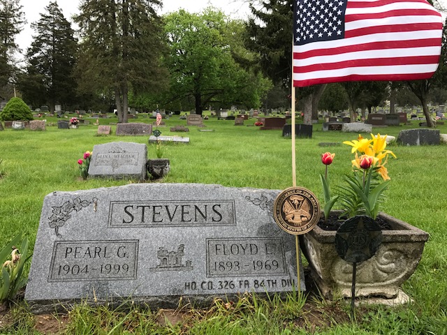 grave marker with flag