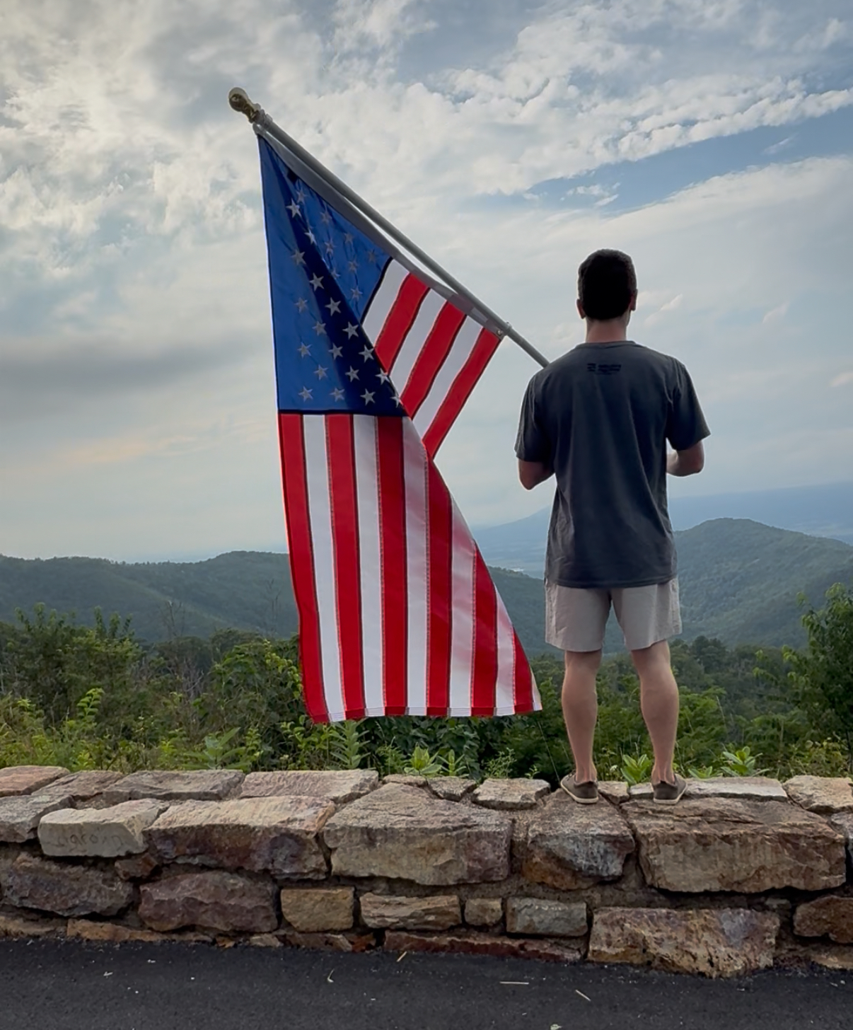 American flag and holder with beautiful landscape background