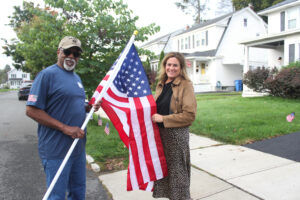 Gettysburg Flag Works owner Maria Coffey presents Master Sergeant Michael Slaughter with a brand new Worry-Free Set as part of the Brothers That Just Do Gutters Gutters For Good program