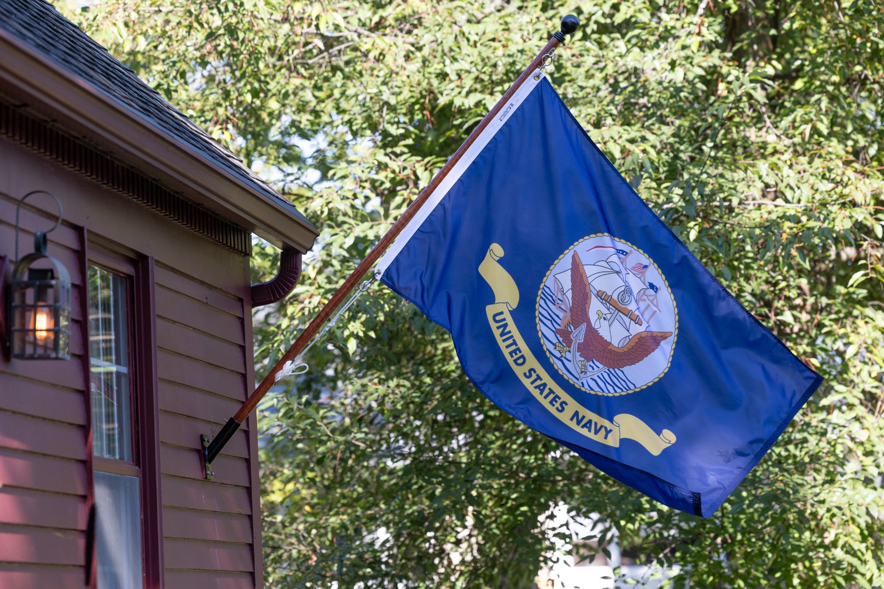 US Navy Flag full front on house mount pole photoshoot